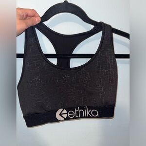 cute Ethika size medium sports bra. black with “cracked” look